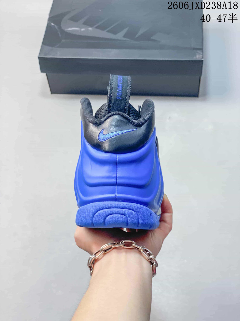 Rear view of the blue Nike Foamposite Pro sneaker