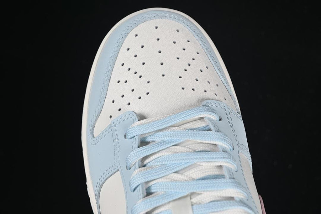 Top view of perforated toe and pale blue laces