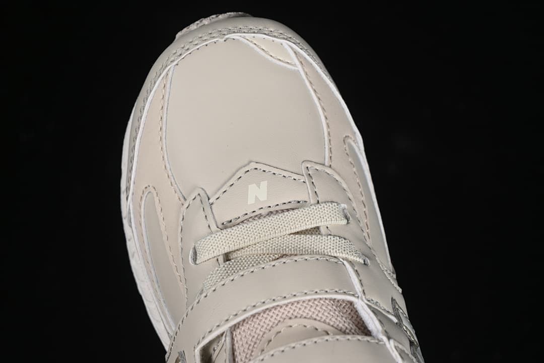 Top-down close-up of the toe, laces, and upper