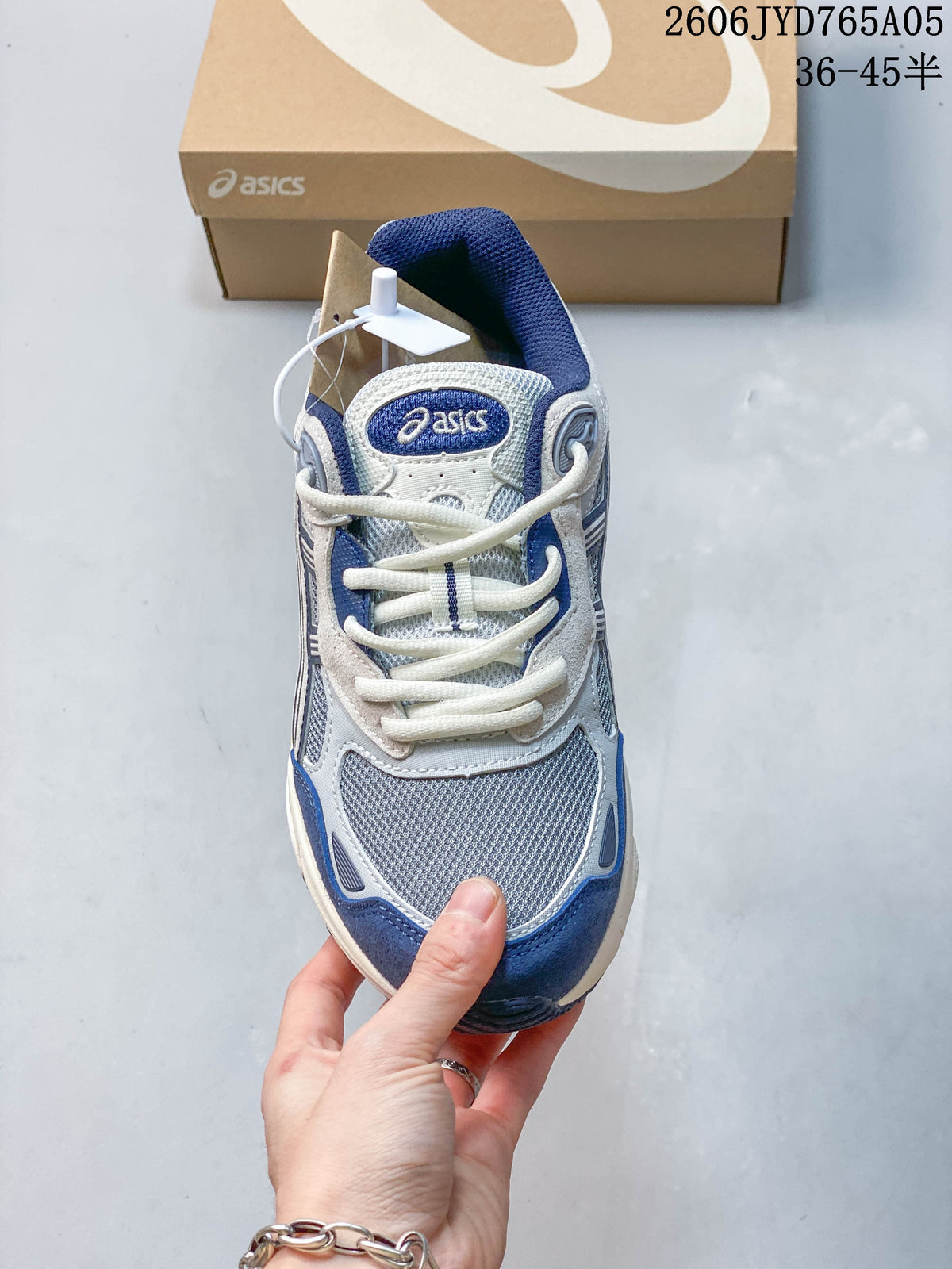 Top view showing the sneaker's mesh toe, laces and layered panels.