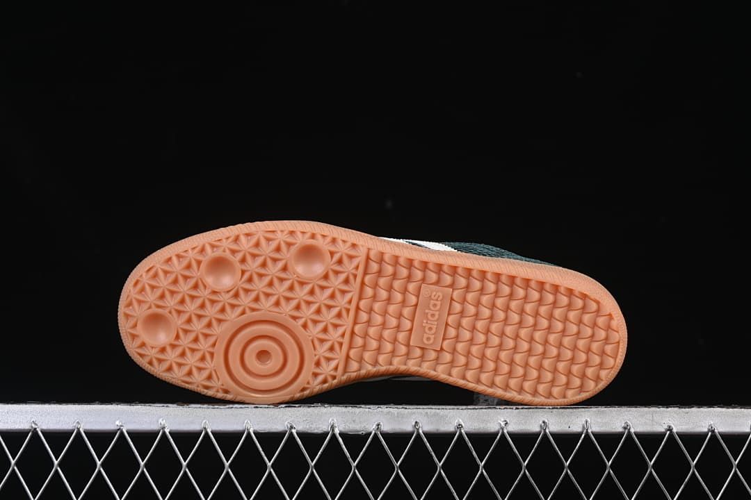 Underside of a gum-colored sole with patterned tread
