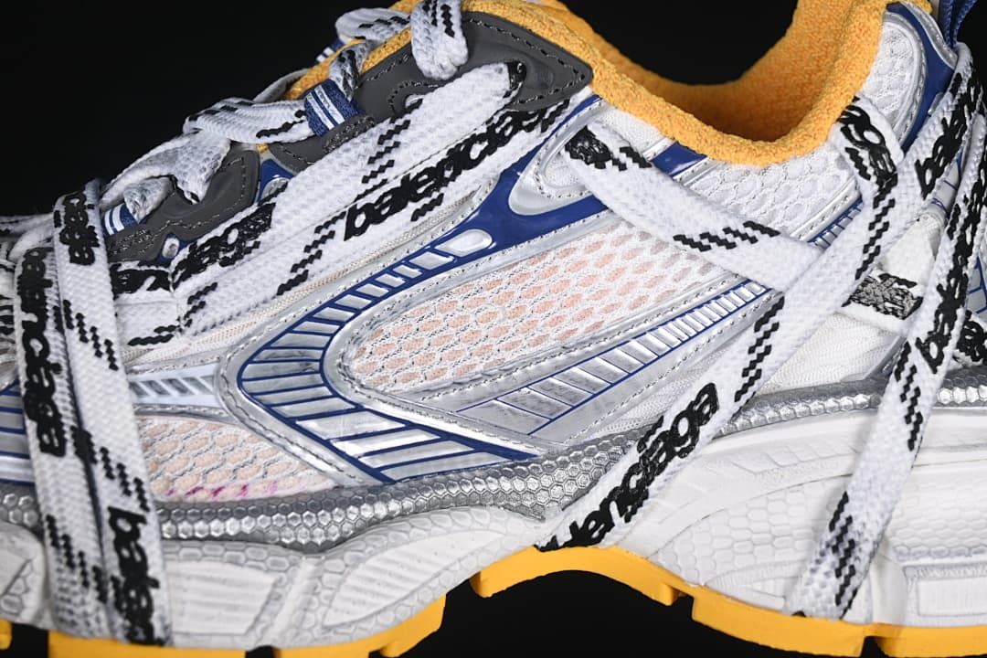 Close-up of the sneaker side panels, mesh-like sections, and branded laces