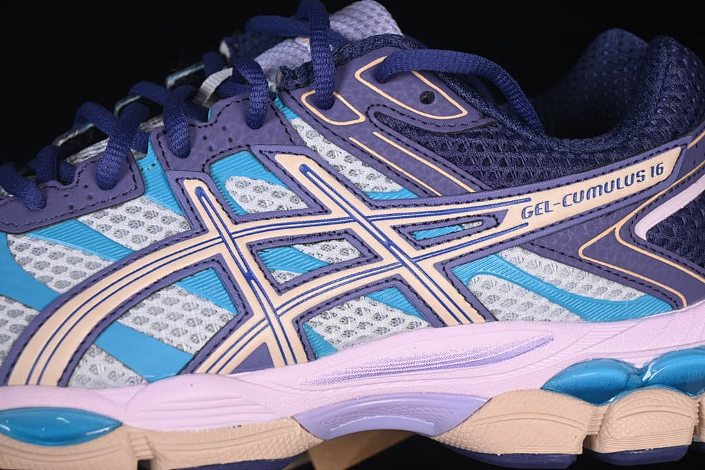 Close-up of the ASICS side design, mesh panels and midsole.
