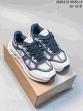 Pair of grey, black and white On Cloudtilt Remix sneakers viewed from above.