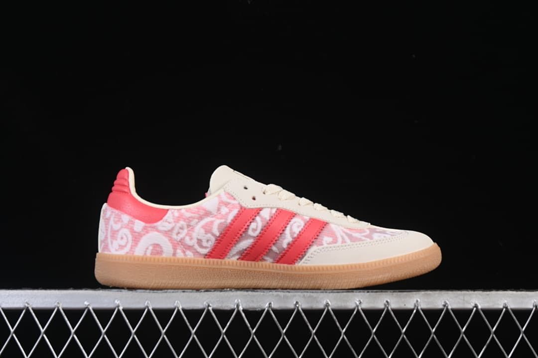 Side profile showing the pink patterned upper and gum outsole