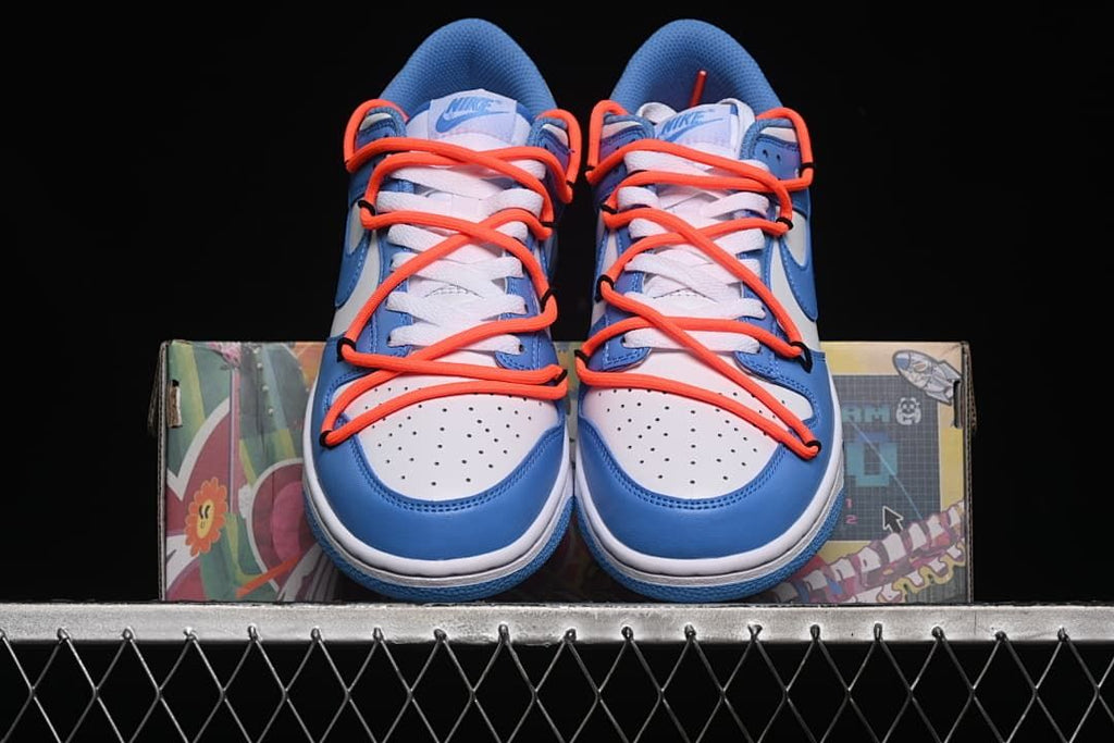 Front view of the pair highlighting the perforated toe boxes and bright overlay laces.