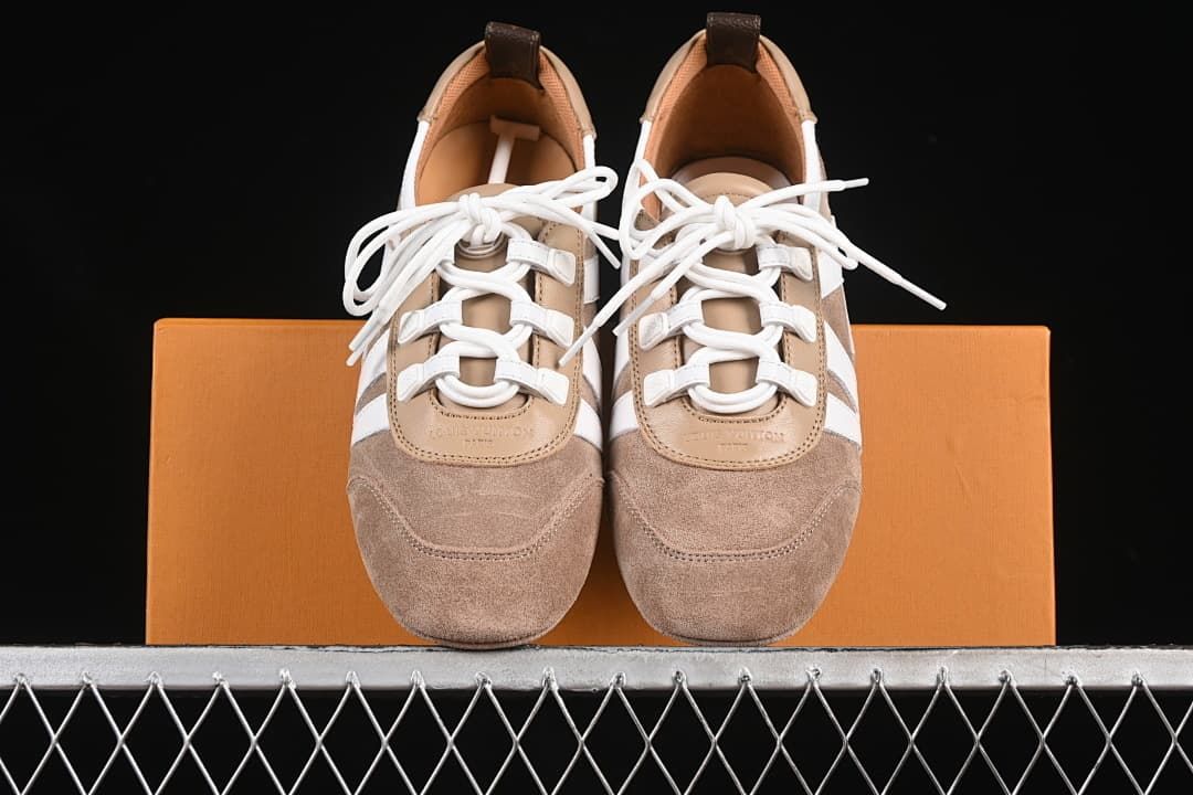 Front view of the pair showing rounded toes and lace-up details