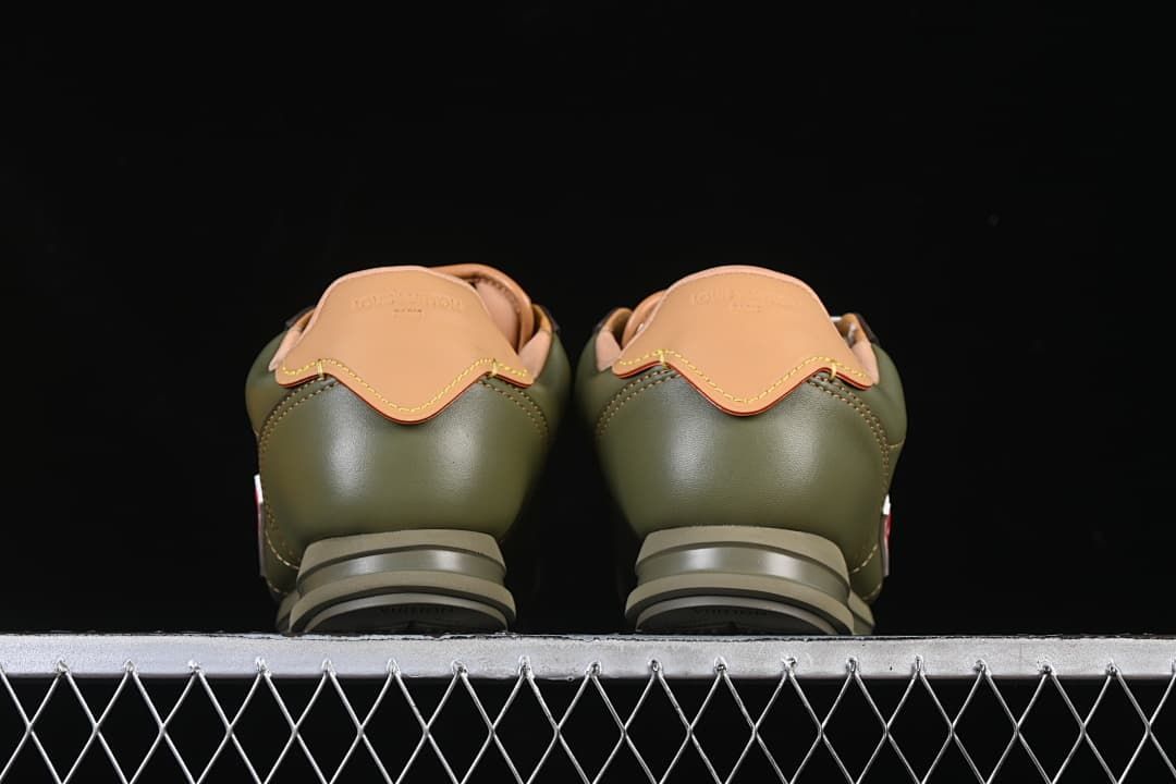 Rear view of the pair showing tan heel tabs and olive green heel panels