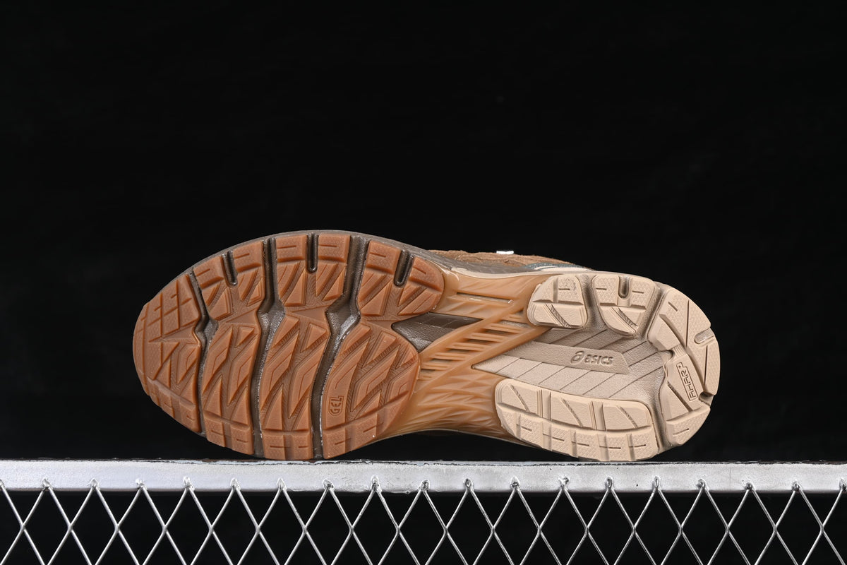 Underside view showing the patterned brown and beige outsole.