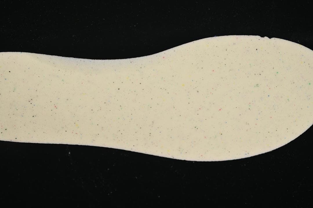 Light-colored shoe insert shown from above.