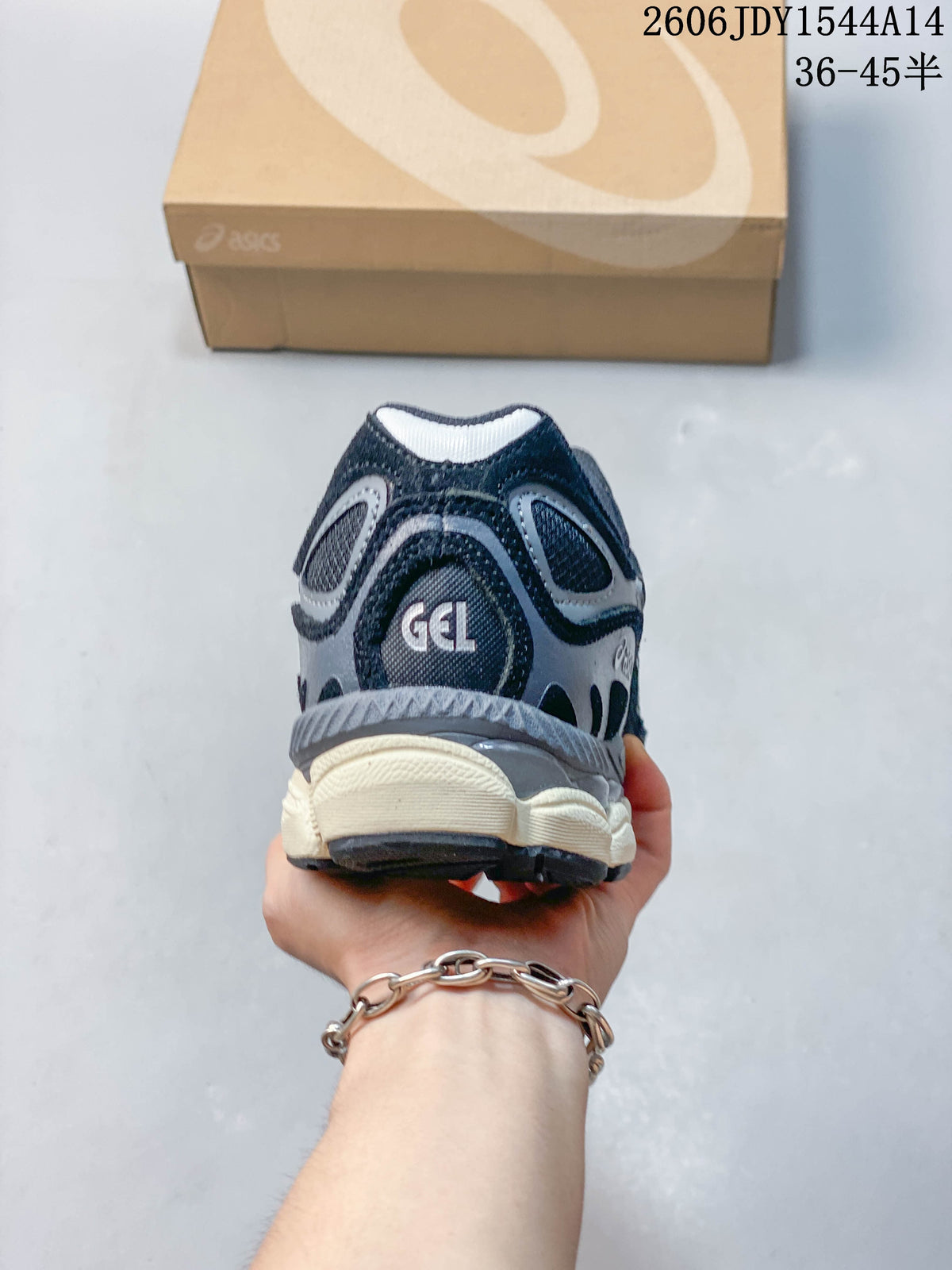 Rear view of the sneaker showing the heel and layered upper