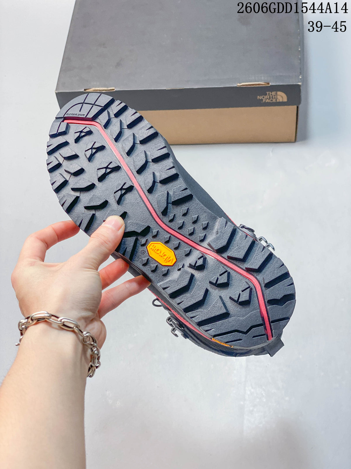 Close-up of the hiking boot outsole with prominent tread lugs