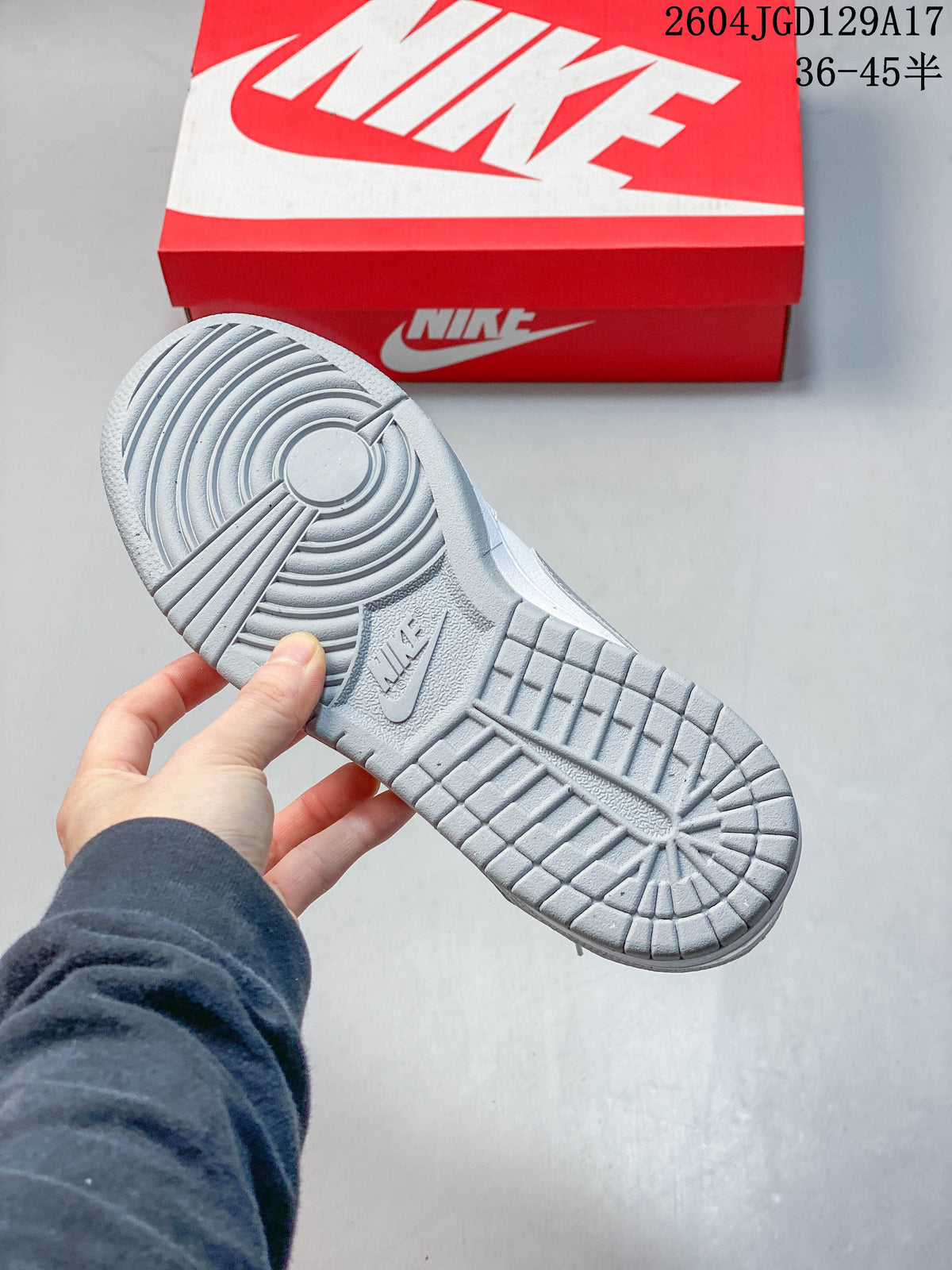 Close view of the grey patterned outsole on the Nike Big Low sneaker.