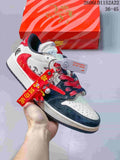 Low-top sneaker with white, red, and navy panels, graphic details, and decorative red charm; size range 36–45 is printed in the image.