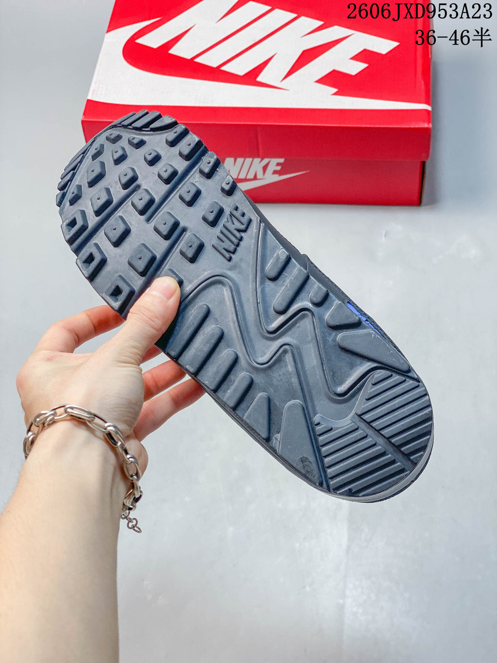 Close-up of the Nike Air Max 90 outsole with its raised tread pattern