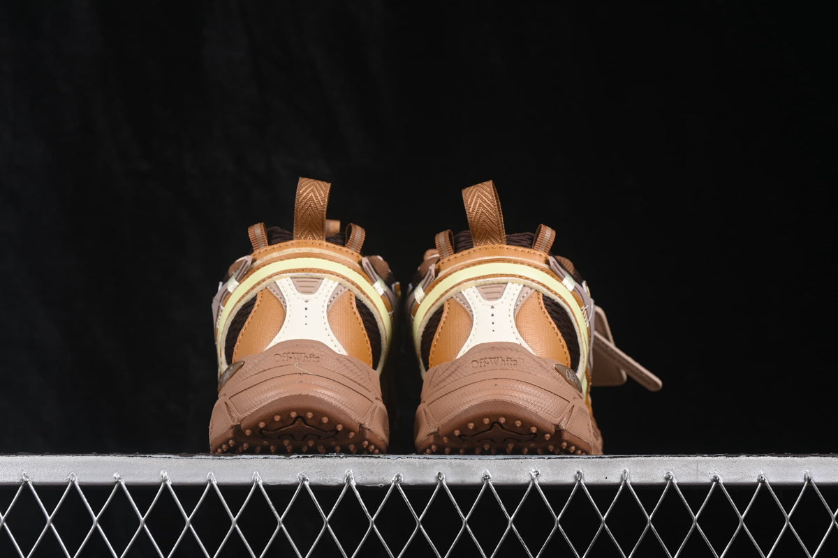 Rear view of the paired sneakers showing heel panels, pull tabs and raised outsole tread.