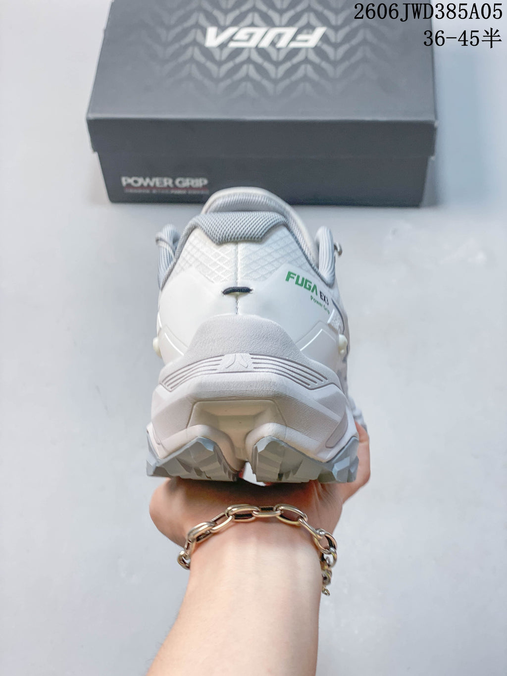 Rear view of the white Kailas Fuga Ex3 shoe showing its heel and tread