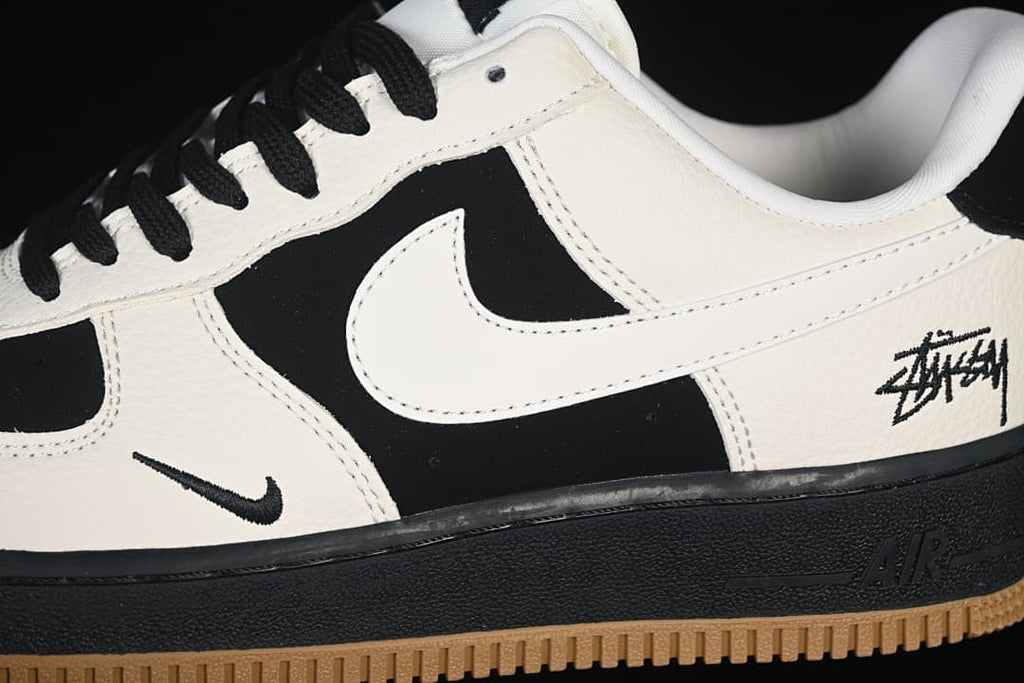 Close-up of the side panels, Swoosh, and signature-style graphic