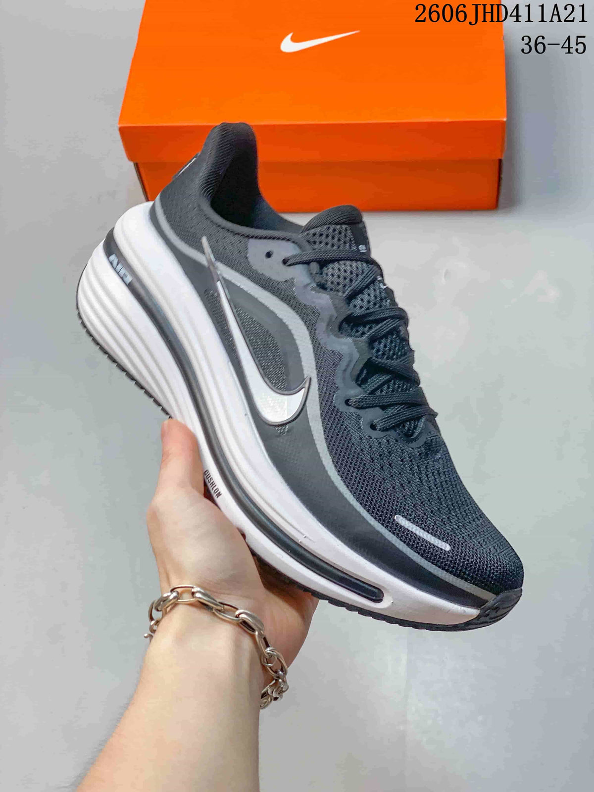 Dark grey Nike Air Zoom Winflo 12 with light grey details and a white sole