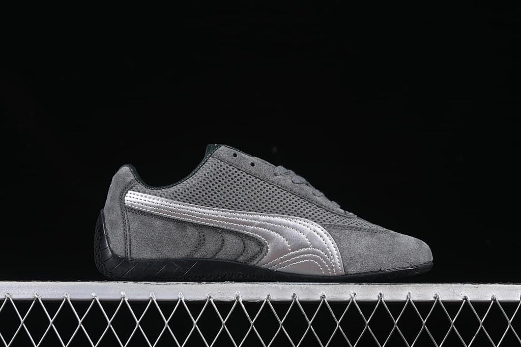 Side profile showing the silver Formstrip and low-profile shape