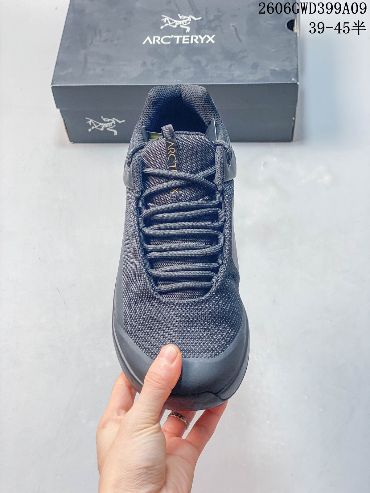 Front view showing the laces, tongue, and toe area