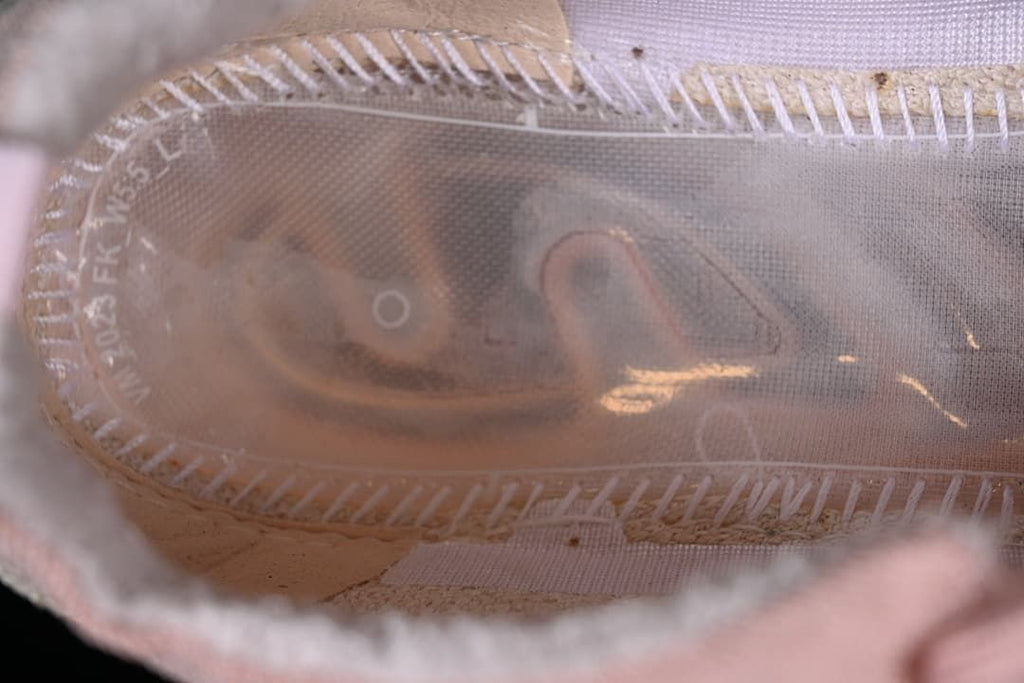 Close-up view inside the shoe showing the translucent sole construction.
