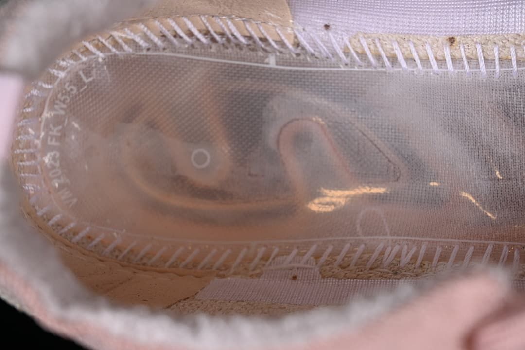 Close-up view inside the shoe showing the translucent sole construction.