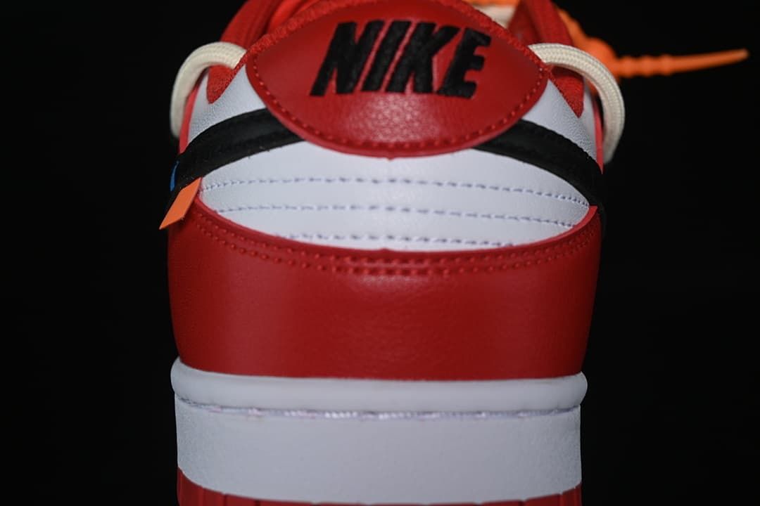 Rear view showing the red heel, white midsole, and black accents