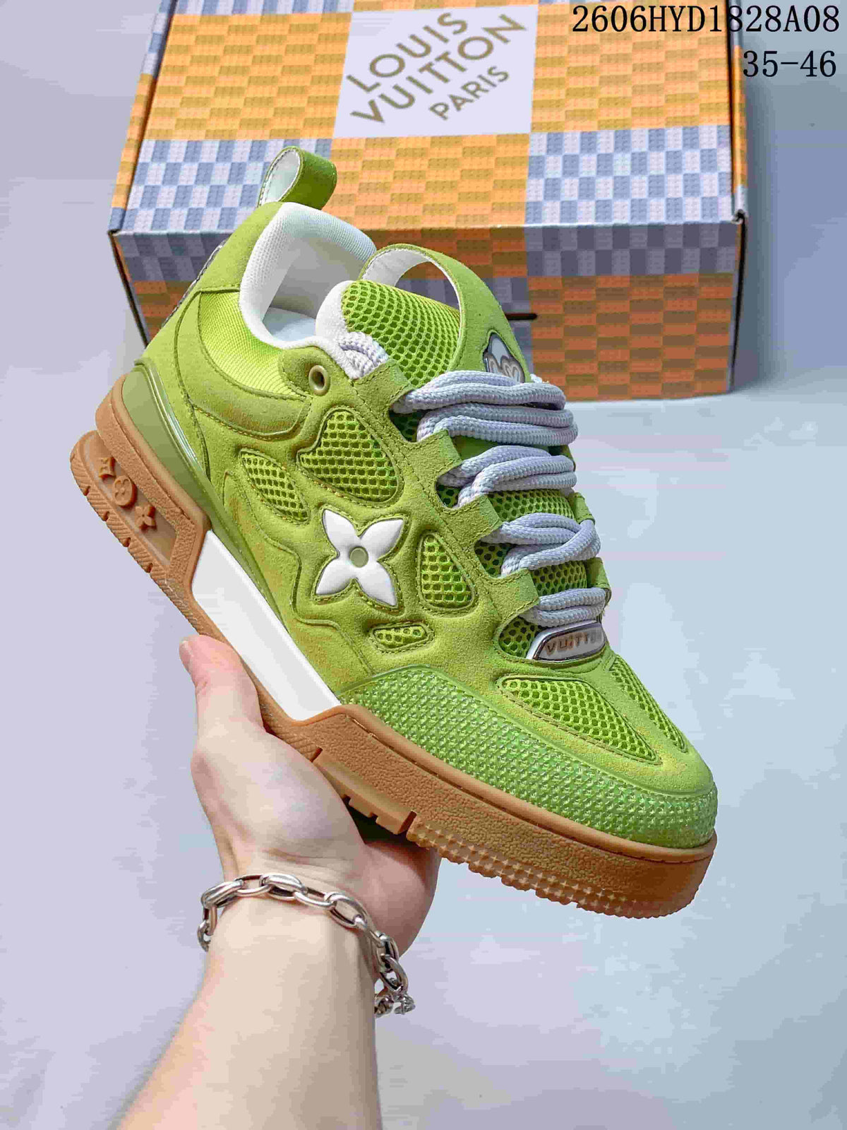 Side view highlighting the flower-shaped detail and gum-colored outsole