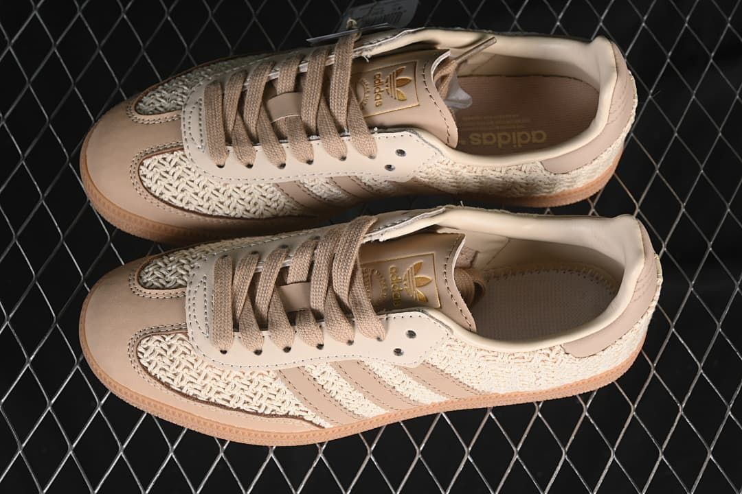 Top view of a pair of beige and cream Samba OG sneakers
