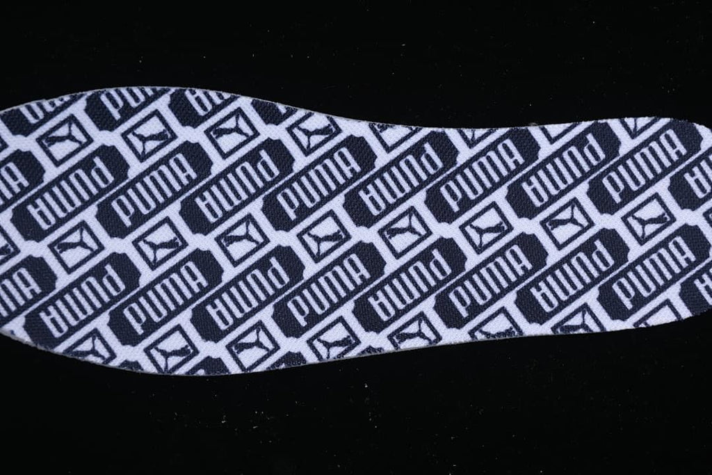 Insole with repeating Puma wordmark and logo pattern