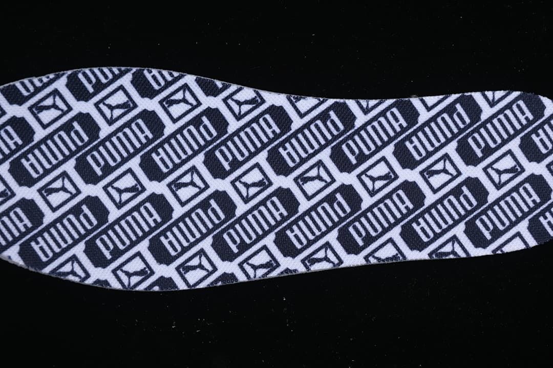 Insole with repeating Puma wordmark and logo pattern