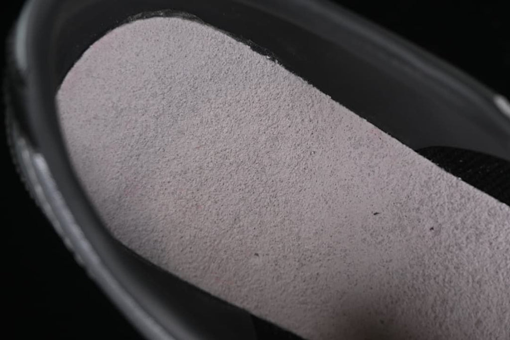 Close-up of the shoe's inner footbed and lining