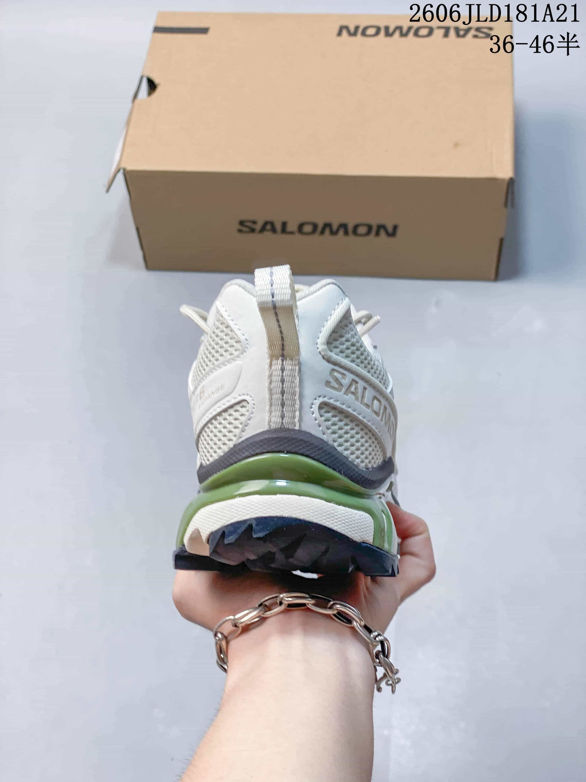 Rear view showing the heel pull tab and green accent around the midsole.