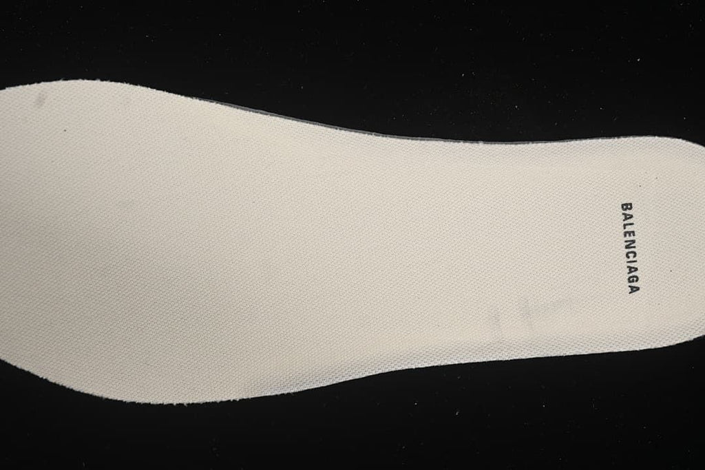 Light-colored insole with Balenciaga text.