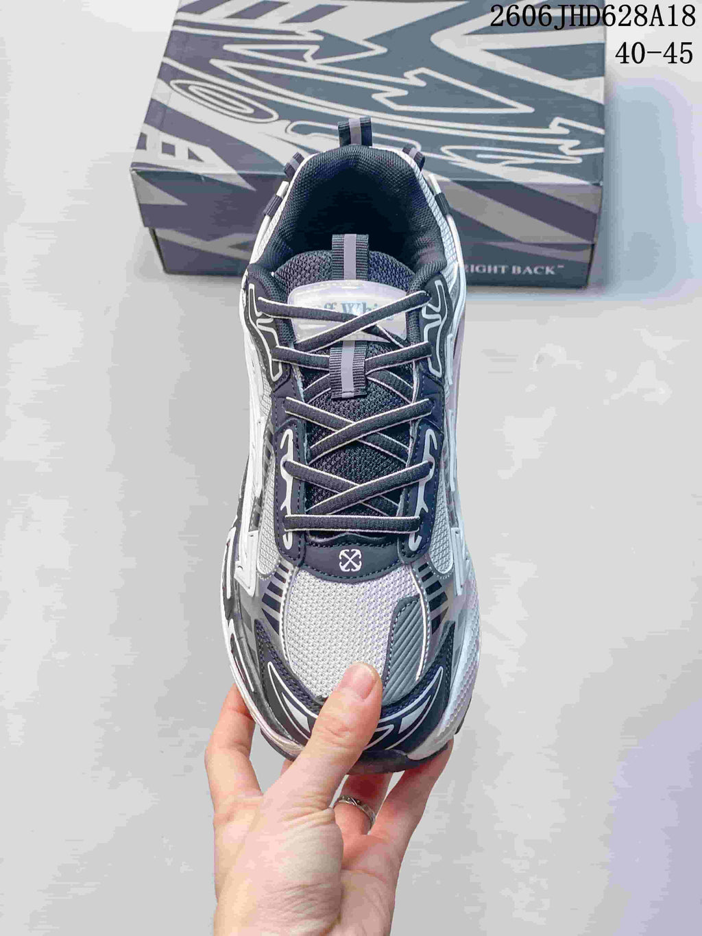 Top view showing the laces, tongue, and contrasting upper panels