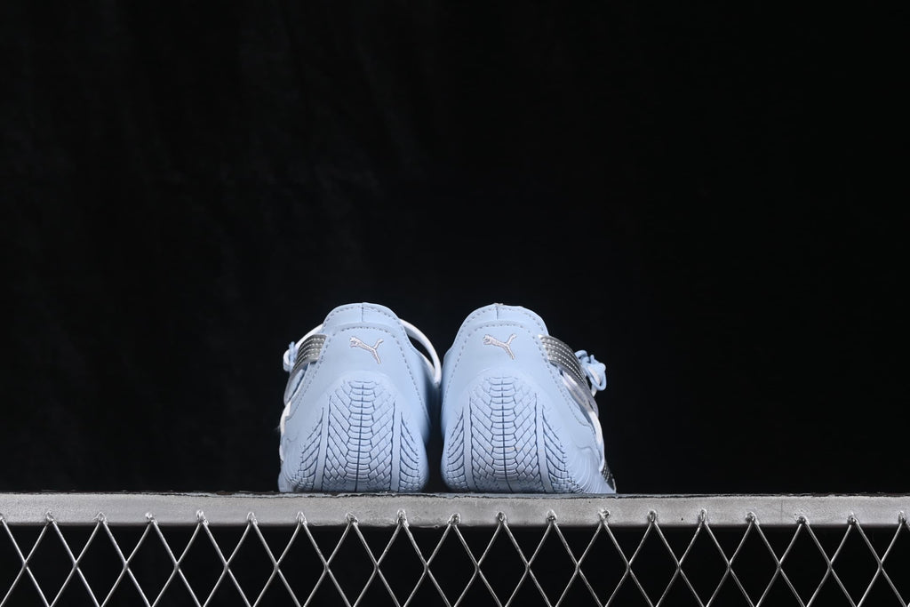Rear view showing the textured heel outsole and Puma logos.