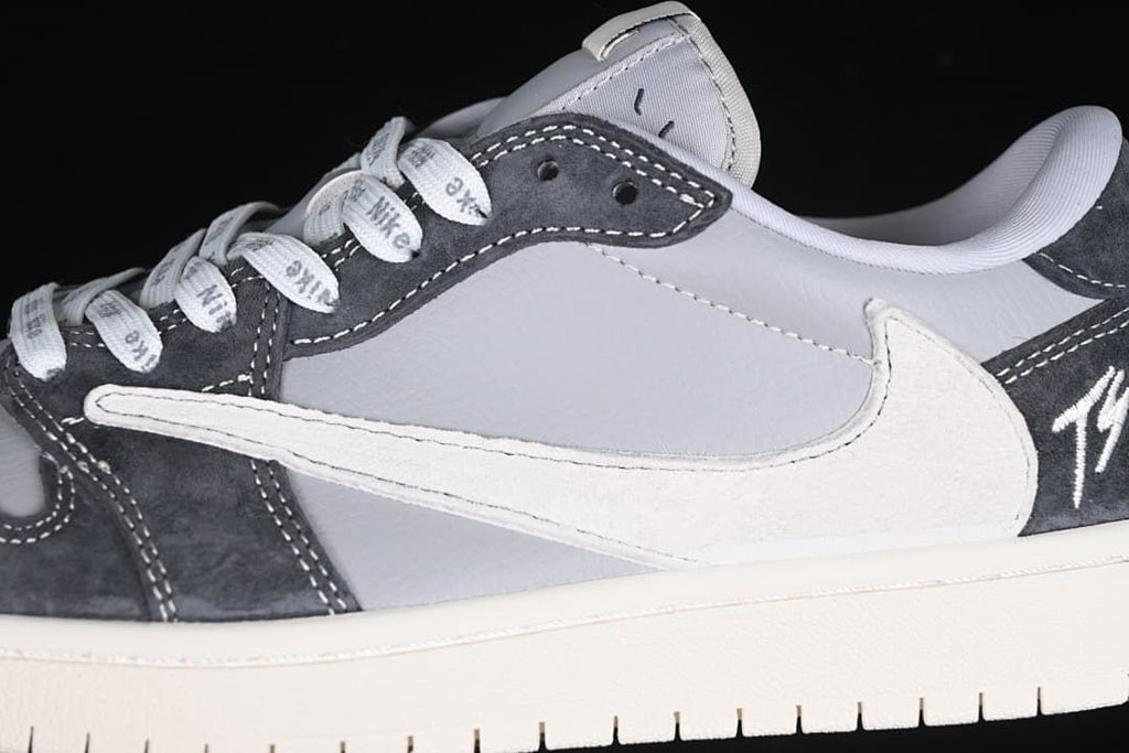 Close-up of the grey side panel, oversized Swoosh, and contrast stitching