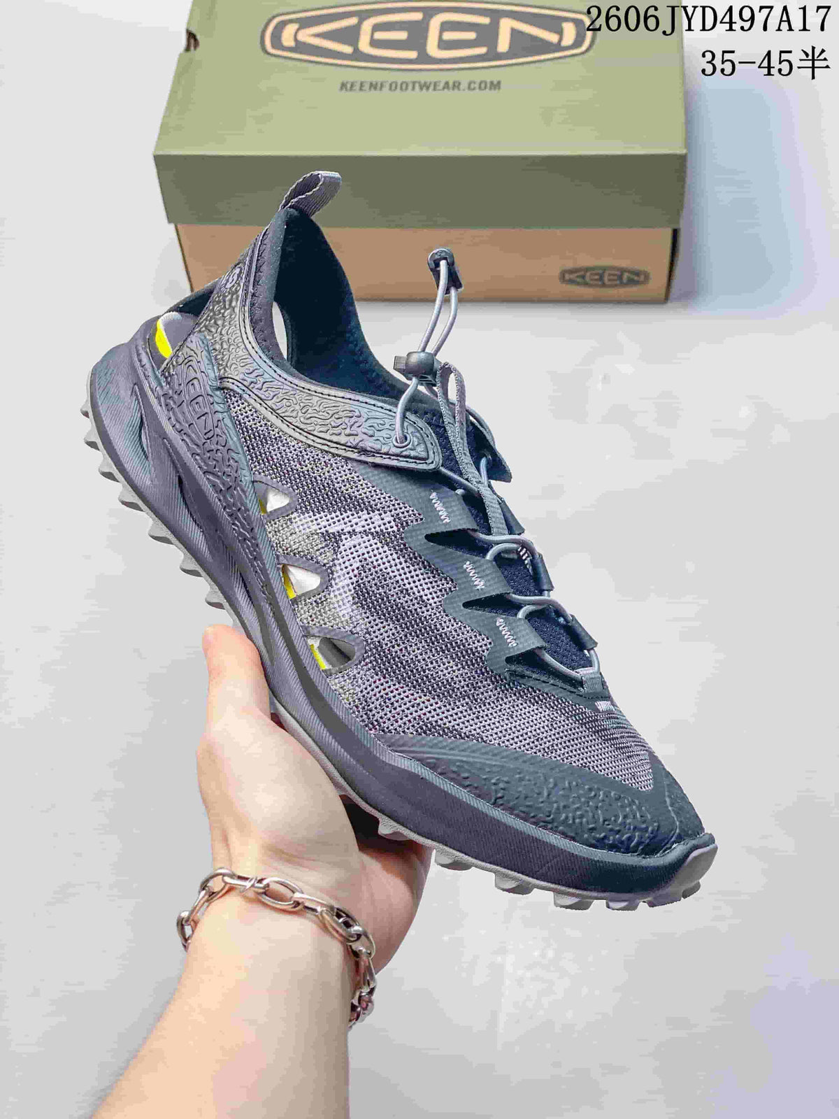 Side view of a gray KEEN Zionic ADV hiking shoe