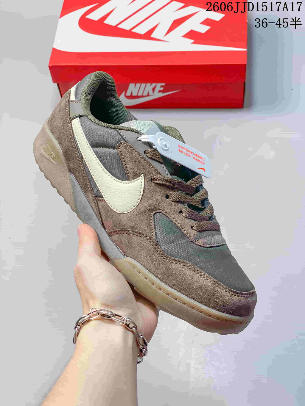 Brown and gray Nike Terra Manta sneaker with a cream Swoosh