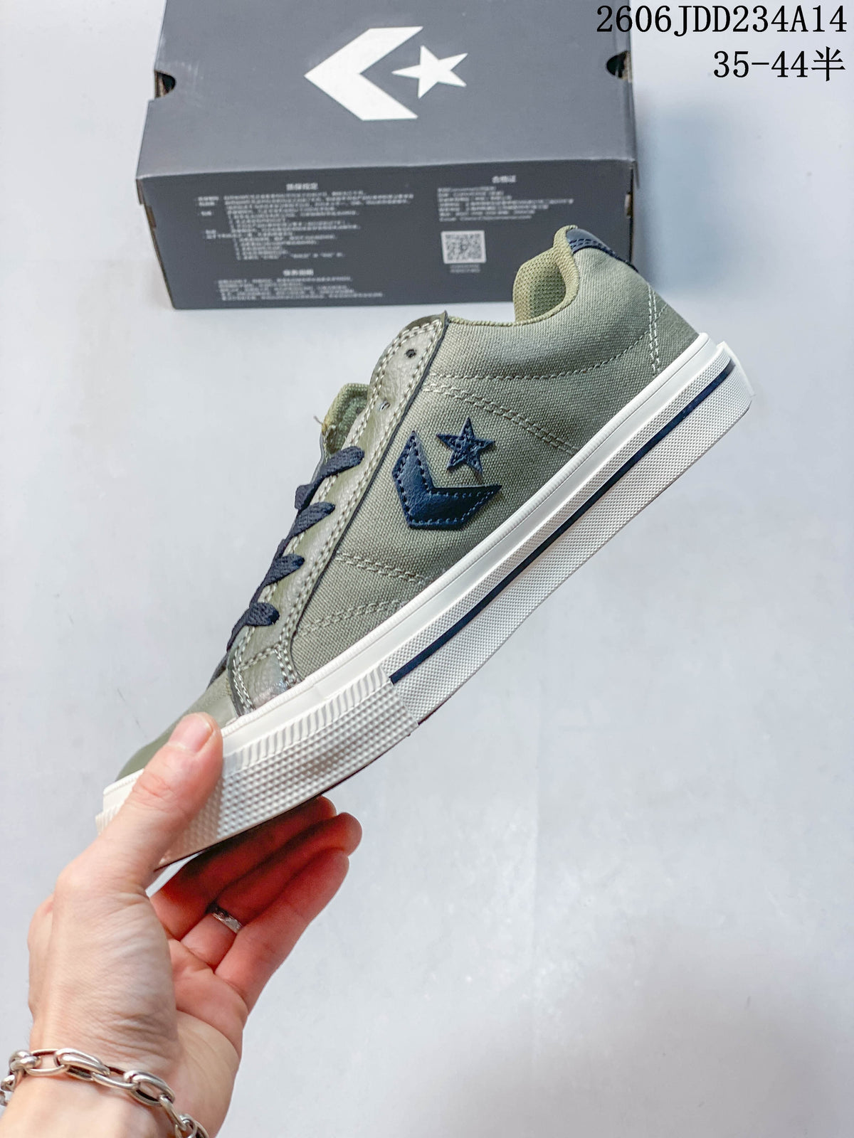 Side view of the olive Converse sneaker with navy star-chevron detail
