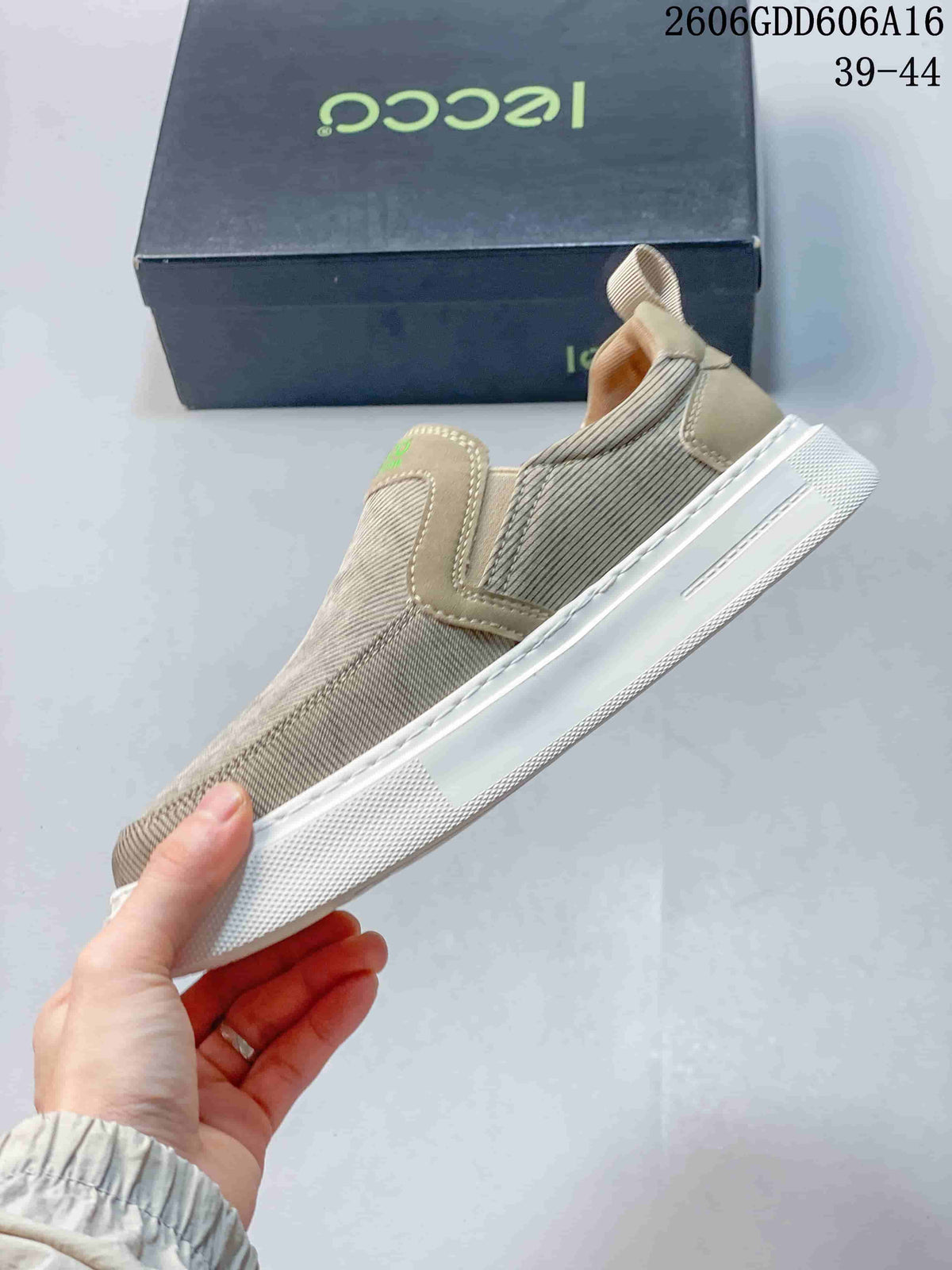Side view of the slip-on sneaker showing stitched panels and white sole