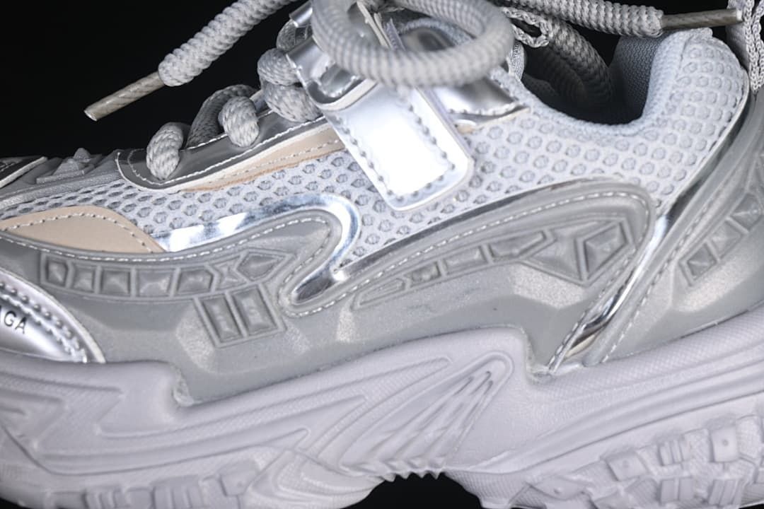 Close-up of mesh-look panels, silver accents, and side detailing
