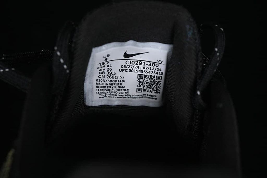 Close-up of the shoe label showing CJ0291-300 and a sample size of EU 41.