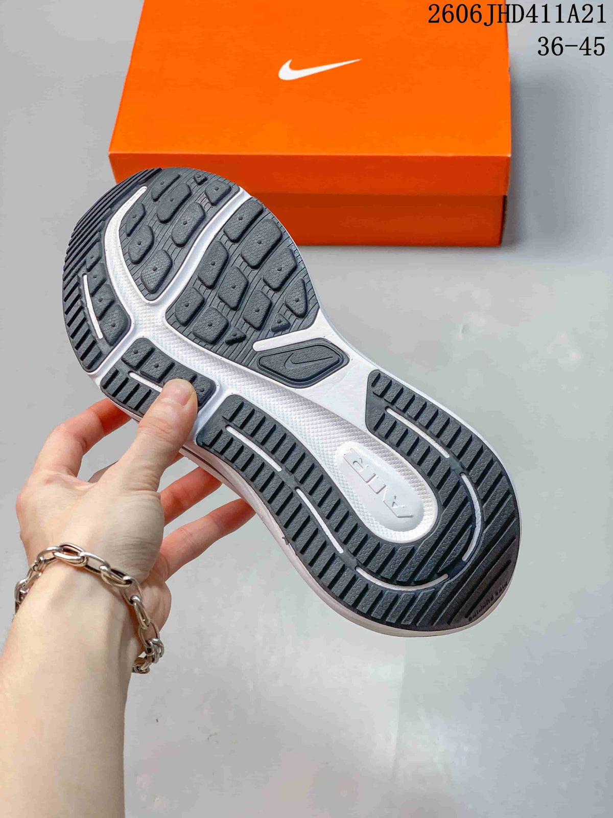 Underside of a Nike Air Zoom Winflo 12 shoe showing the patterned dark outsole