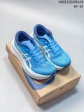 Blue ASICS Magic Speed 4 shoes displayed on a shoebox