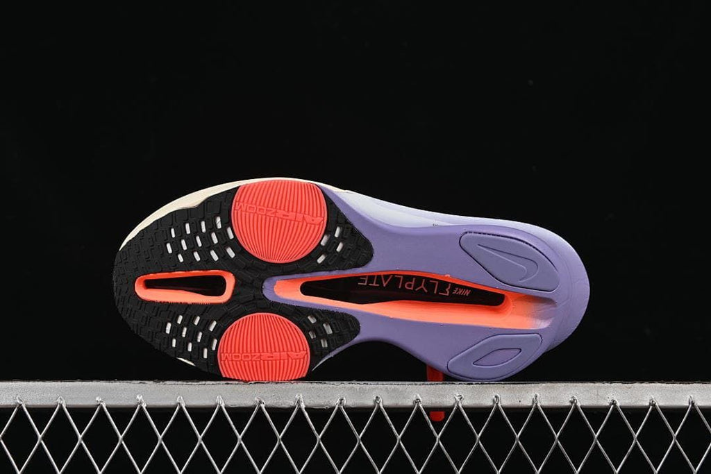 Underside view showing the black, coral and purple outsole
