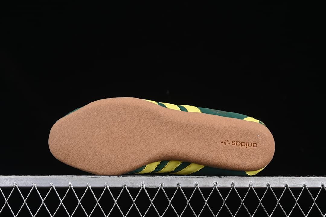 Underside view of the gum-colored outsole