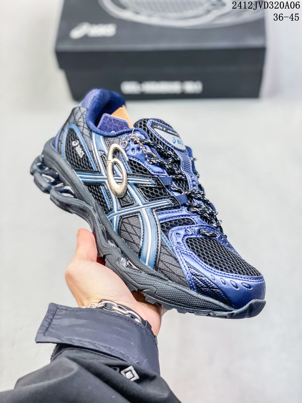 Angled side view of the sneaker showing its ASICS side logo and layered upper.