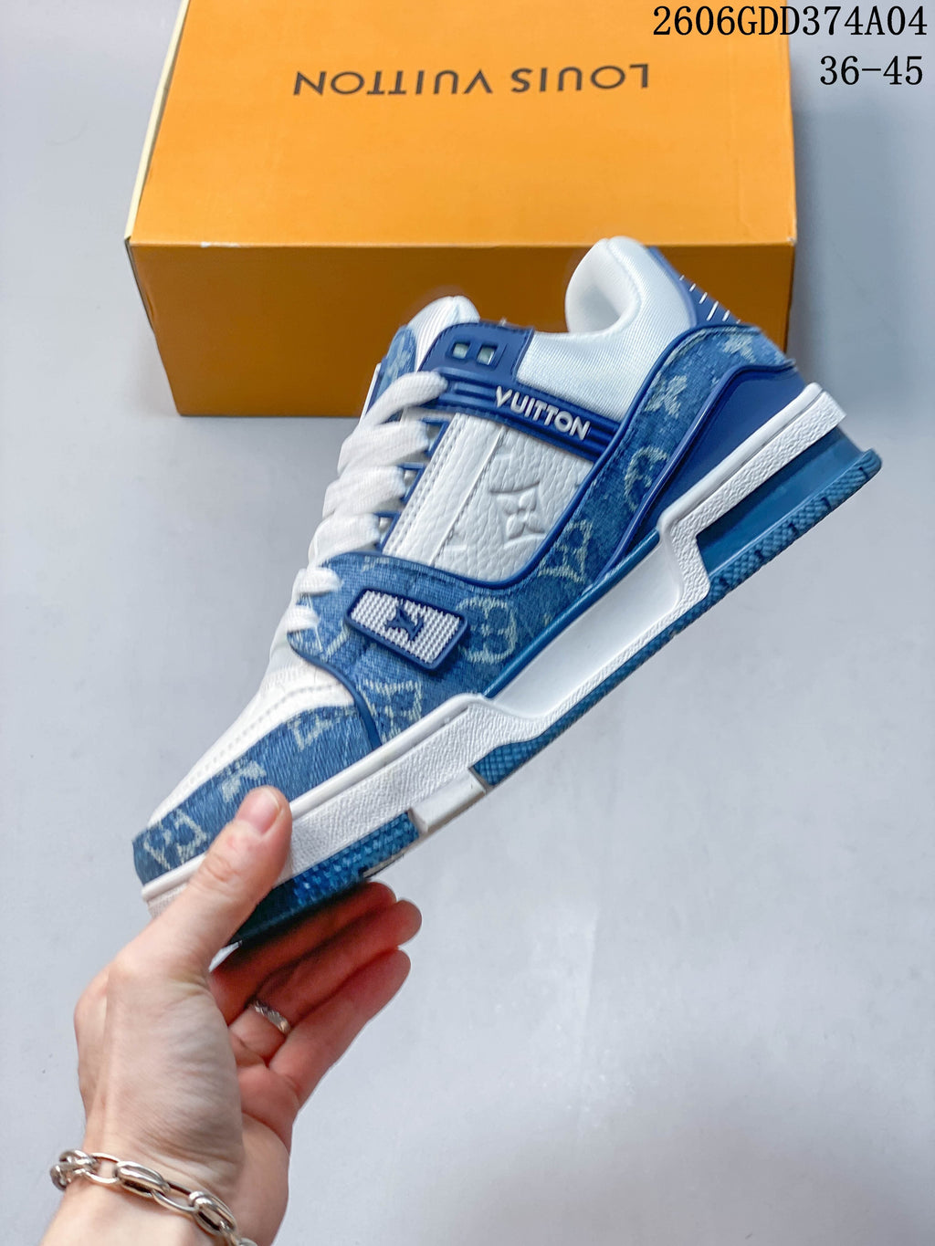 Side view showing the blue patterned overlays and white panels